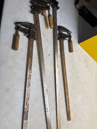 four wood clamps