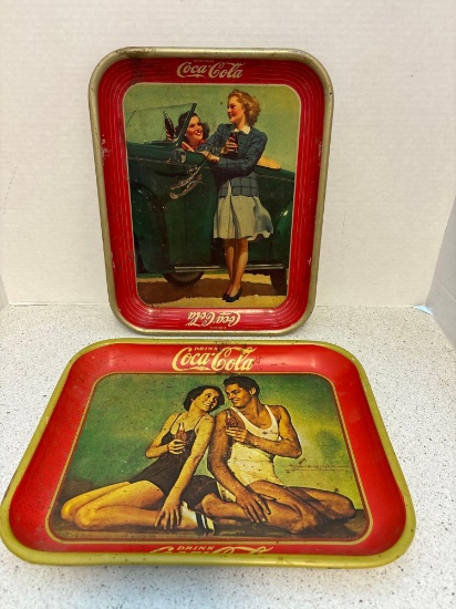 Two original Coke trays