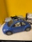 Two toy cars, and a mini drone
