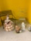 porcelain figurine, metal chairs, paperback books