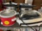 Two crockpots and a George Foreman grilling machine