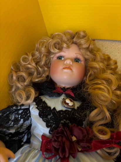 box of vintage dolls