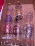 Eight various Big Ten, college glass tumblers