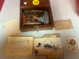 Vintage greeting and postcards in wooden box