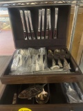 Oneida Community coronation silverware in chest
