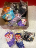 19. Happy meal and older fast food toys in packages.