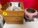 fishing net, wood crate, and vintage lamp