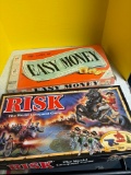 Two board games, easy money and risk