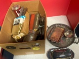 boots, metal trays, paint brushes, etc.