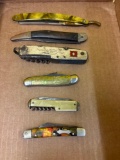 Five pocket knives, one straight razor
