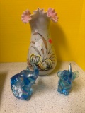 Bristol glass base two elephants both snouts are chipped