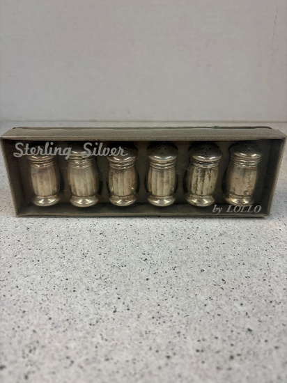 Six sterling silver shakers in box