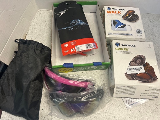 tinted goggles, speedo, YAKTRAX spikes and walk