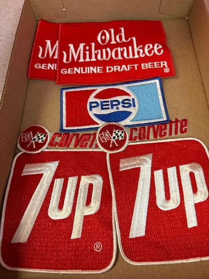 Seven vintage fabric and advertising patches