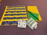 Two baby quilts and fabric