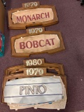 Vintage car dealership, signs and inserts