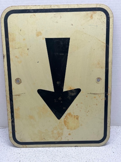 Metal arrow sign