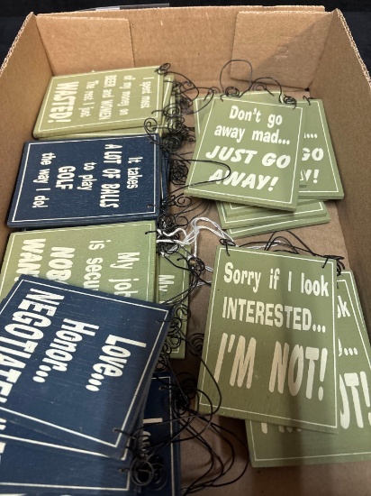 Small wooden signs with cute sayings