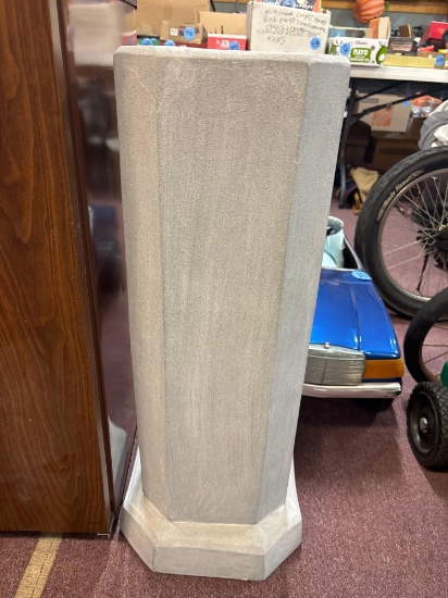 Cast plaster pedestal about 3 foot tall