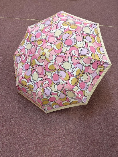 Coach signature logo, pink and beige umbrella