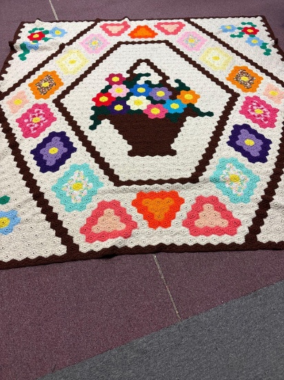 Very large colorful afghan, flower basket