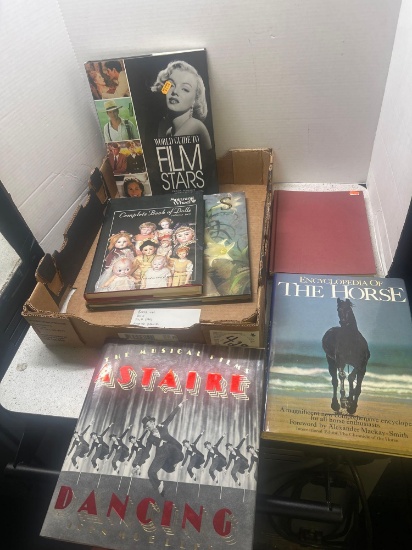 books on dolls, film stars, astaire dancing, the horse, greyhound