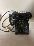 vintage black rotary dial telephone with WMMS sticker