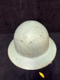 Old metal helmet with liner, possibly military
