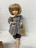 collectible yesterdays child doll on stand