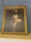 Framed photo of lady and hat