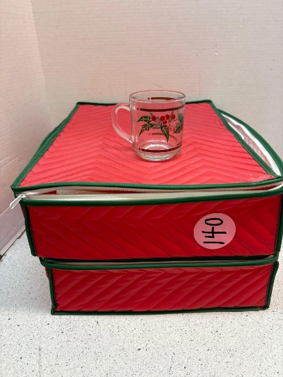 16 glass holiday mugs in storage cases
