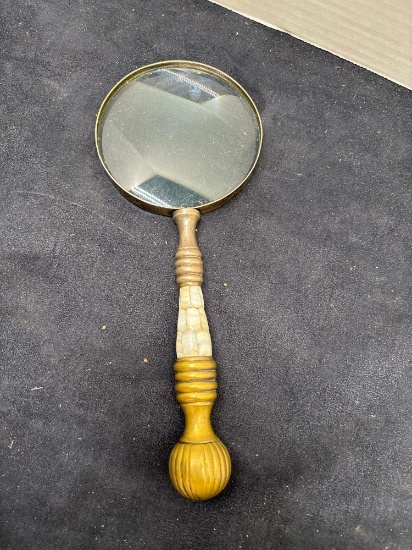 brass handheld magnifying glass