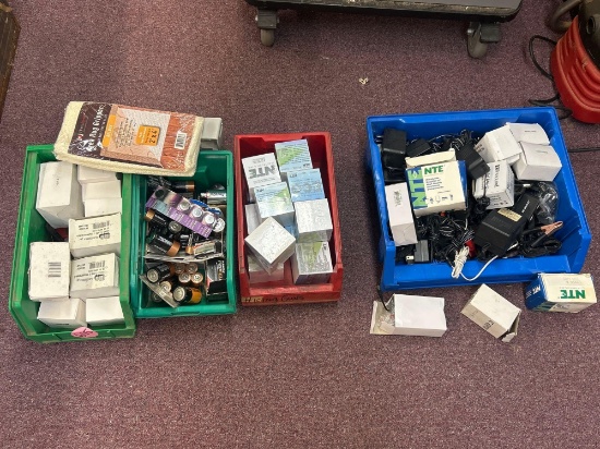 batteries, charging cables, electronics, sticky notes, transformers, etc.
