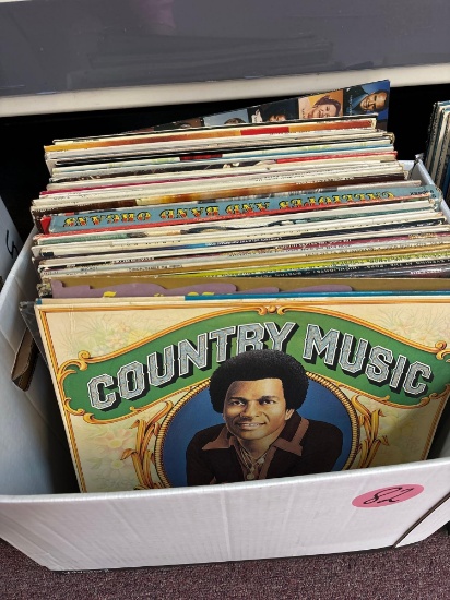 Two boxes of mixed genre records