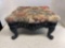 vintage cast iron footstool with tapestry