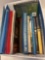 box of vintage books and folders
