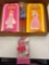 two vintage Barbie paper dolls, Barbie doll, and ice-skating clothes