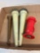 Four vintage nozzles, including a brass one