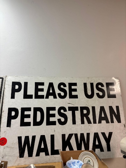 Please use pedestrian walkway, metal sign