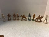9 vintage World War II composition toy soldiers