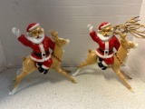 pair of vintage Santa riding reindeer Christmas lights