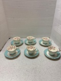 Six Homer Laughlin cups and saucers