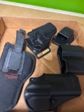 Gun holsters, and ammo holders