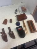 knife sheaths, miracle spring lifts, vintage light Bulb etc