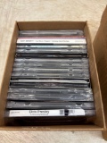 six small boxes of CDs and music DVDs