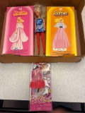 two vintage Barbie paper dolls, Barbie doll, and ice-skating clothes