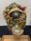 Mannequin head with jewelry and more
