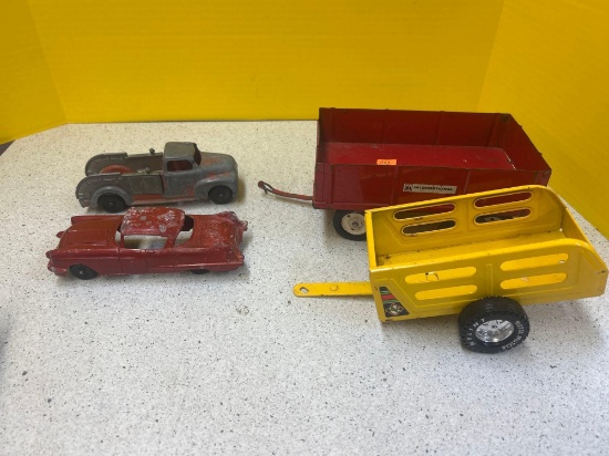 vintage metal toy, trailers, and trucks
