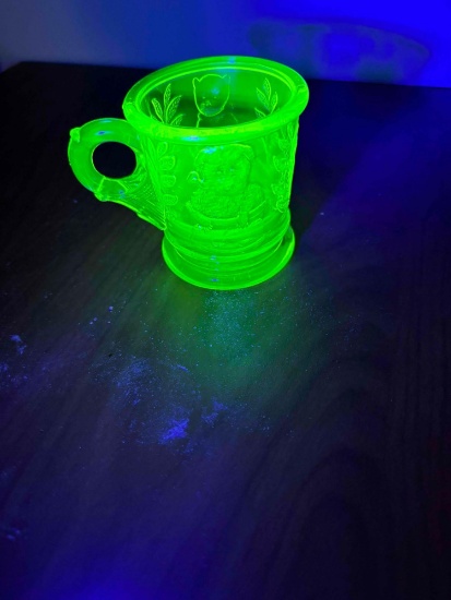 Uranium class child cup, cat on basket, dog on drum