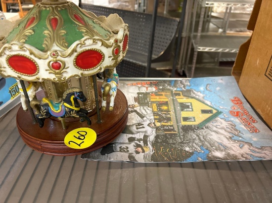 vintage Ferris wheel collectible, and the Browns versus Saints poster